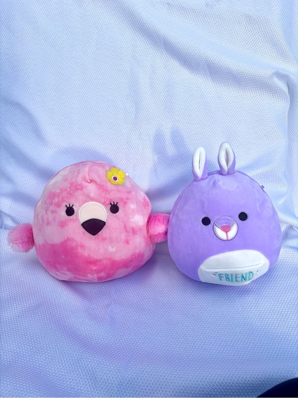 Squishmallows pink Cookie Flamingo and purple Kiki kangaroo